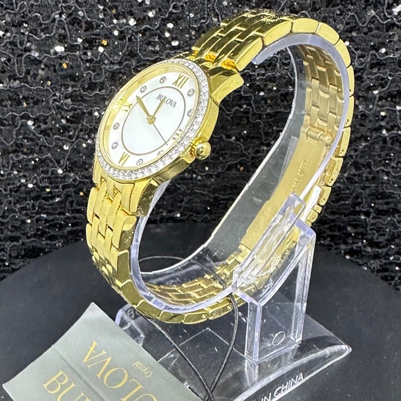 Women's (NWT) Gold Bulova with Crystal Bezel, and Mother Of Pearl & Diamond Face - Picture 2 of 3